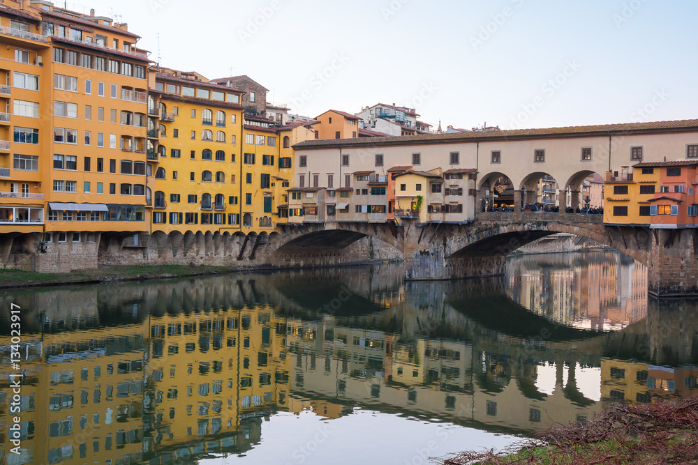 Ponte Vecchio bridge and Arno river in Florence, Italy.
