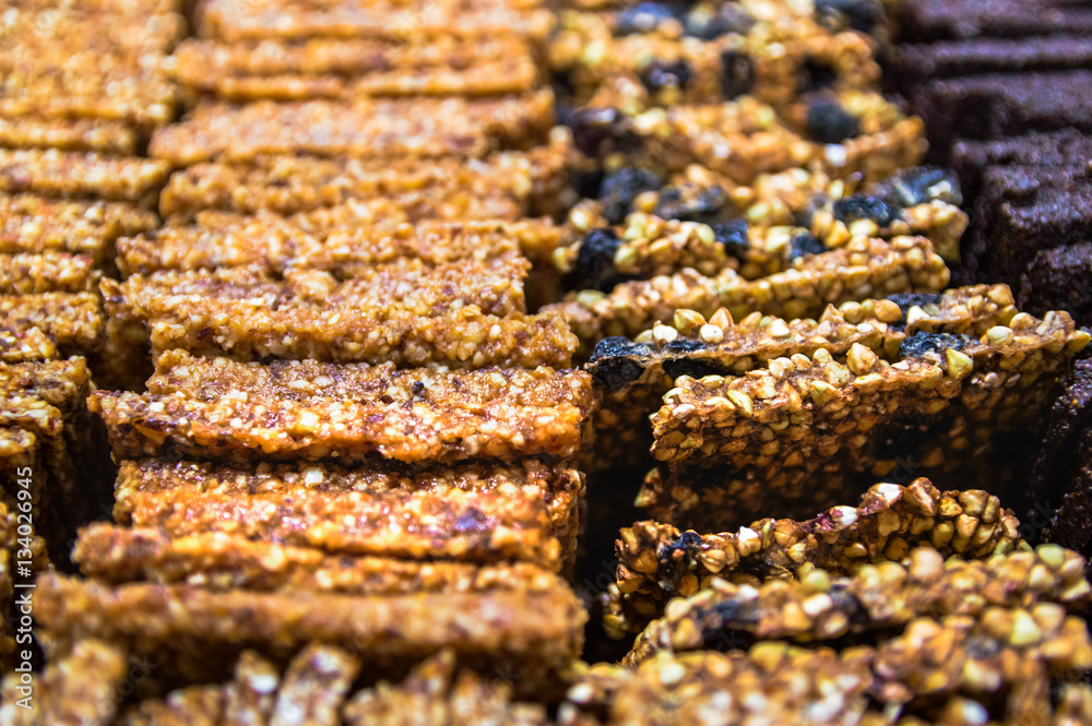 Raw healthy dessert handmade from dates and nuts - gozinaki Raw healthy dessert handmade from dates and nuts - gozinaki