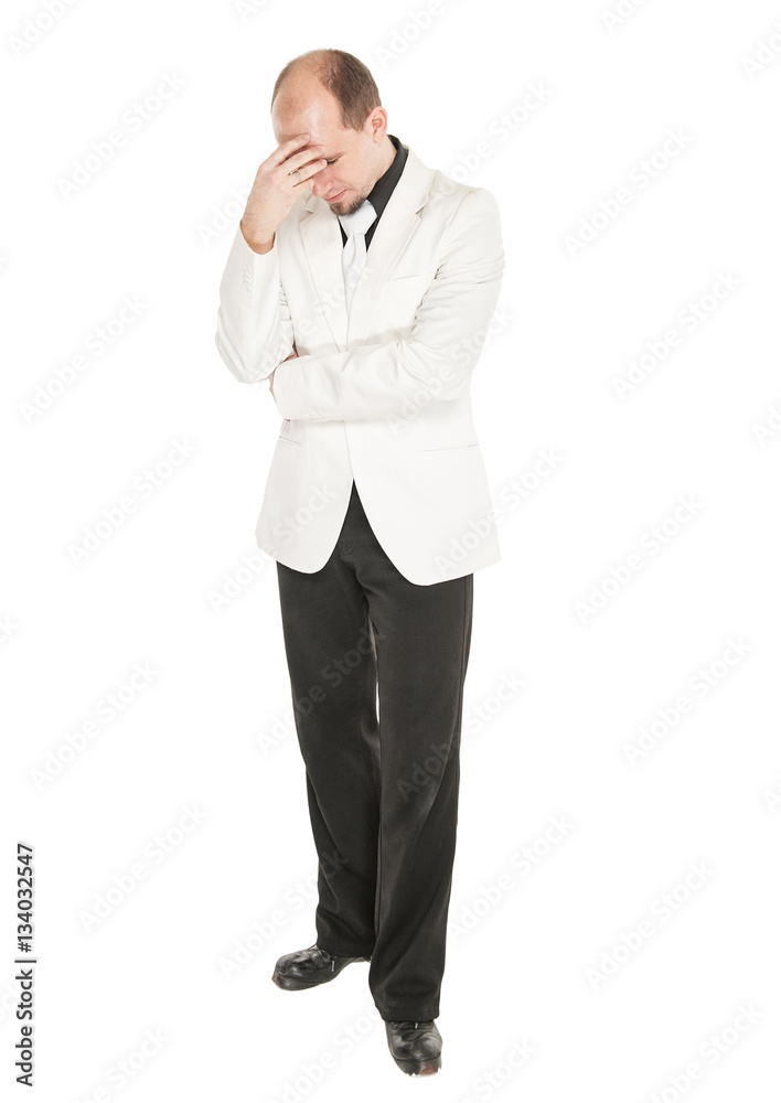 Sad man holding his head by hand isolated