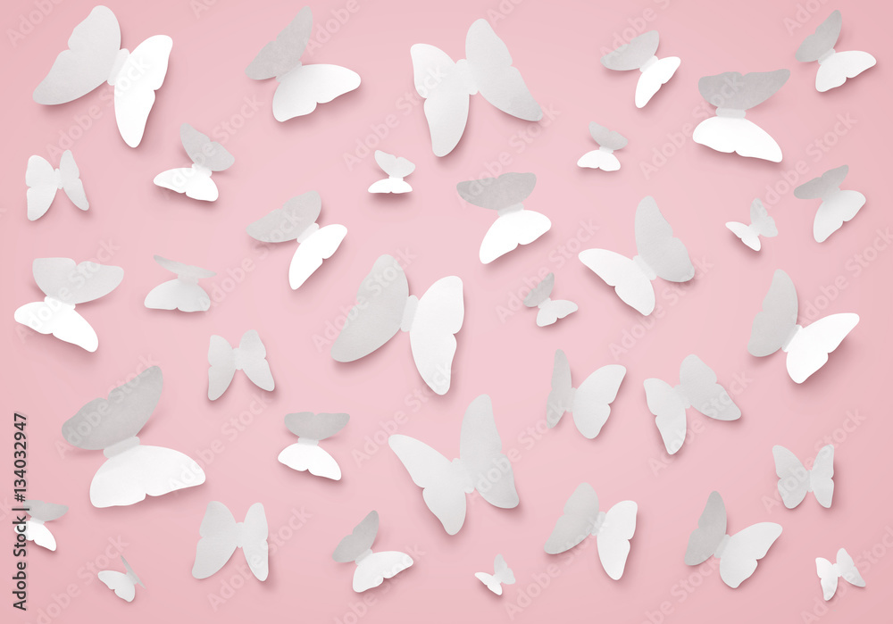 Flat lay paper butterflies pattern on pink background. Love and Valentine's day concept. Top view Flat lay paper butterflies pattern on pink background. Love and Valentine's day concept. Top view