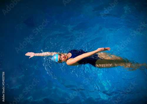 Young woman swimmer photo