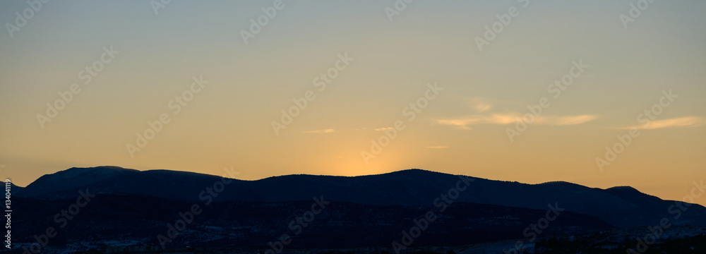 Background of sunset over mountains