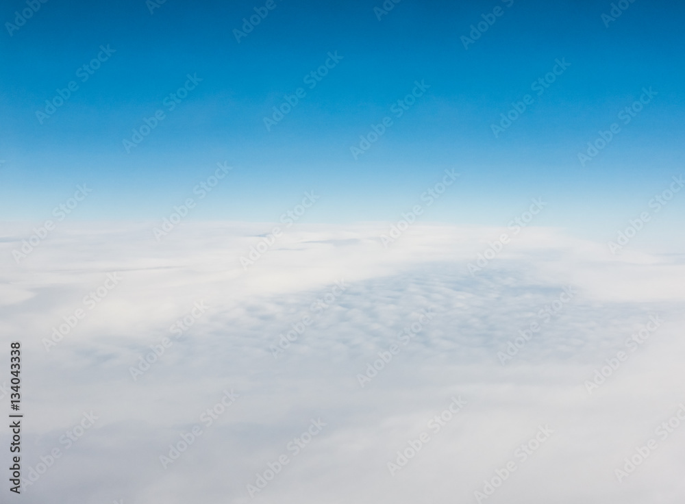 Aerial view of a sea of clouds and blue sky Aerial view of a sea of clouds and blue sky
