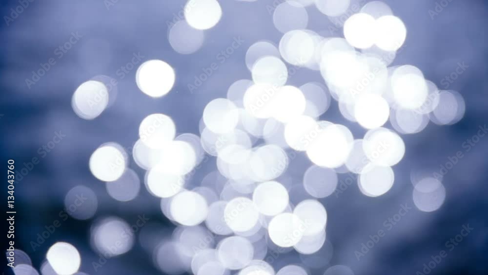 Soft focus bokeh light effects on water Soft focus bokeh light effects on water