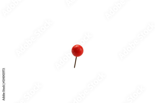 stationery small pin with a ball stuck in a white isolated background