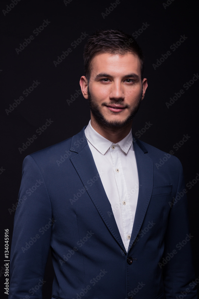 young adult man smirking suit elengant young adult man smirking suit elengant