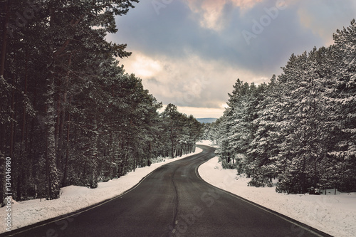 The journey through the snowy road. Feelings of traveling.