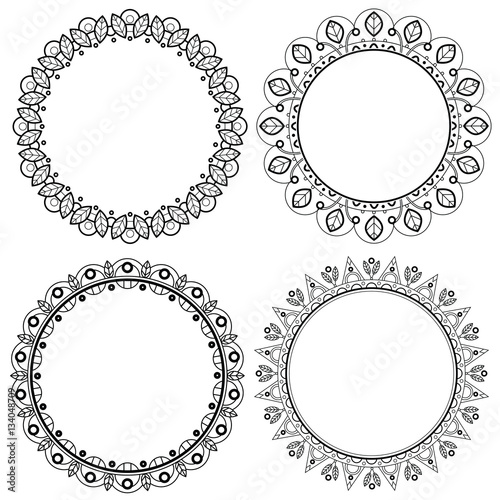 Set of spring floral round frames with leaves, flowers and berries. Decorative elements. Isolated on white background.