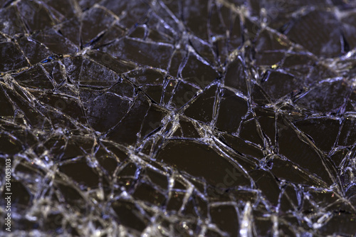 Close up image of a shattered smartphone screen