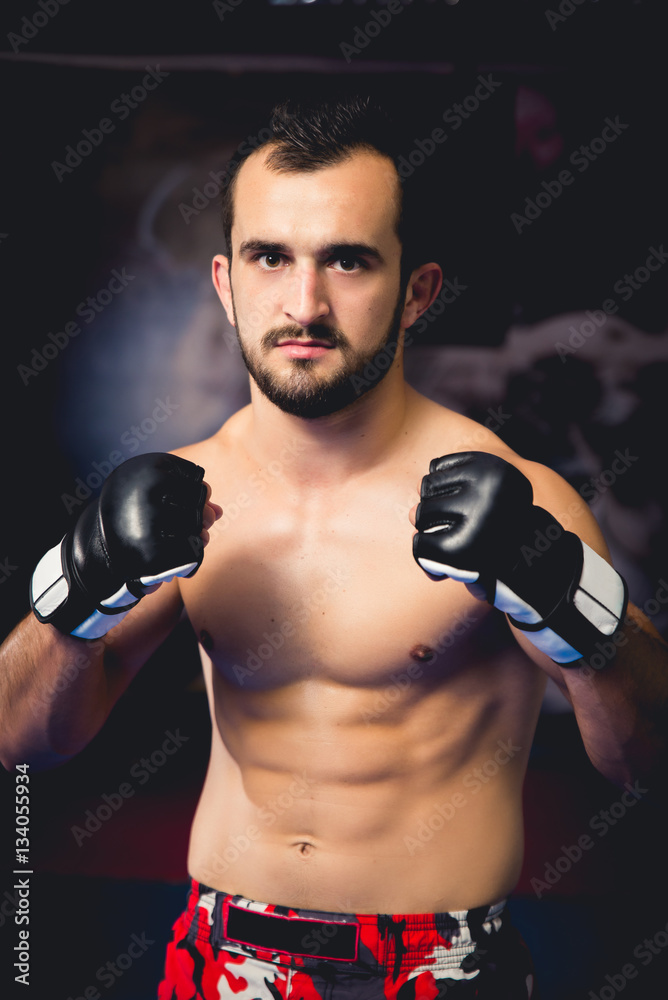 Mixed martial arts fighter close up shot standing in guard