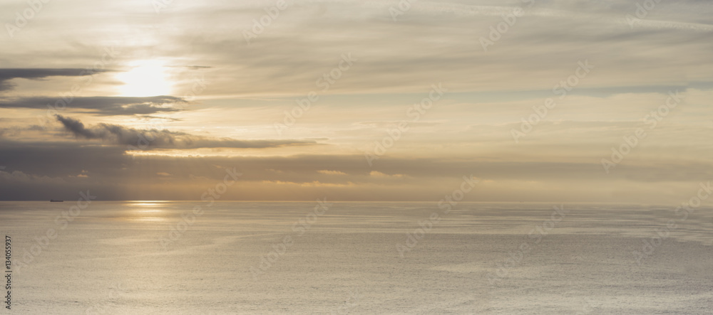 Clouds sky and sunlight sunset on horizon ocean. People on background seascape dramatic atmosphere rays sunrise. Relax view waves water sea, mockup nature evening concept perspective ocean sunrise