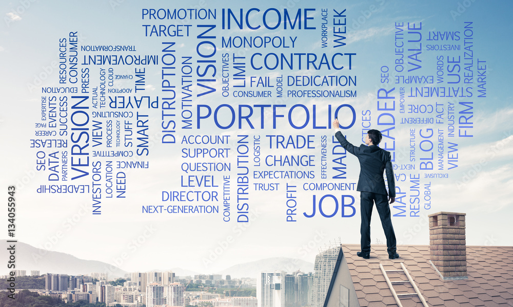 Young businessman standing on house roof and writing leadership Young businessman standing on house roof and writing leadership
