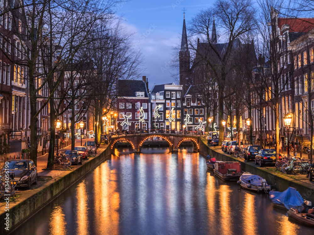 Amsterdam canal Leidsegracht and bridge in the evening
