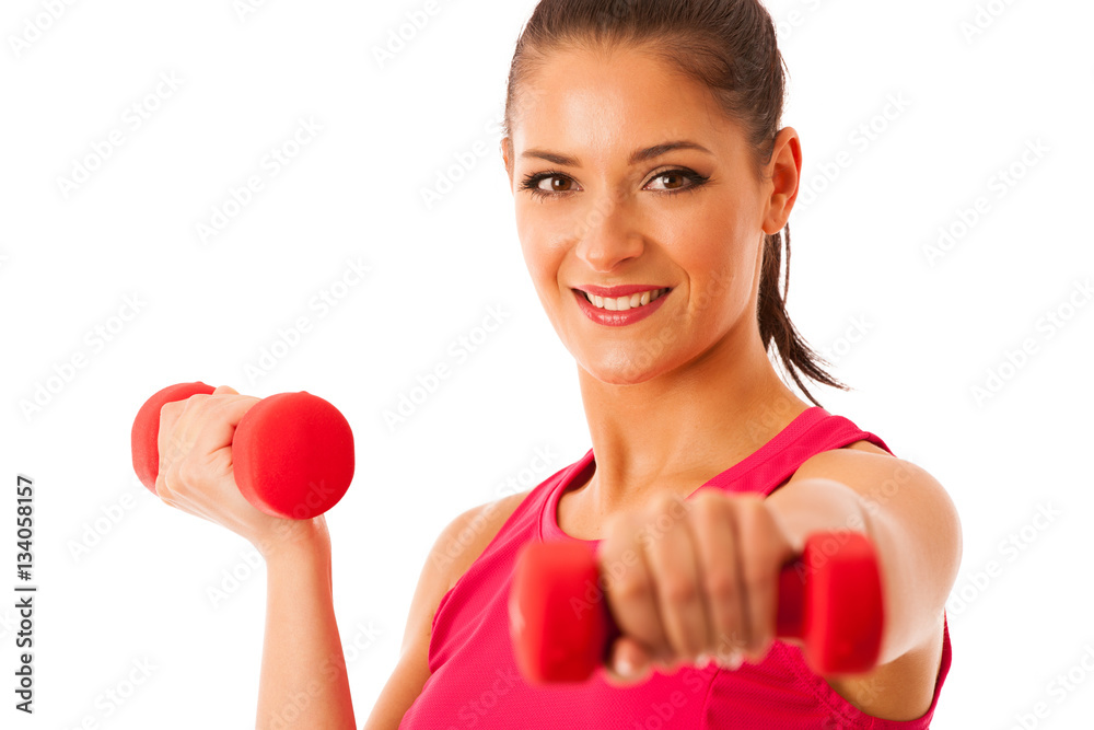 Active young woman workout with dumbbells in fitness gym isolate Active young woman workout with dumbbells in fitness gym isolate