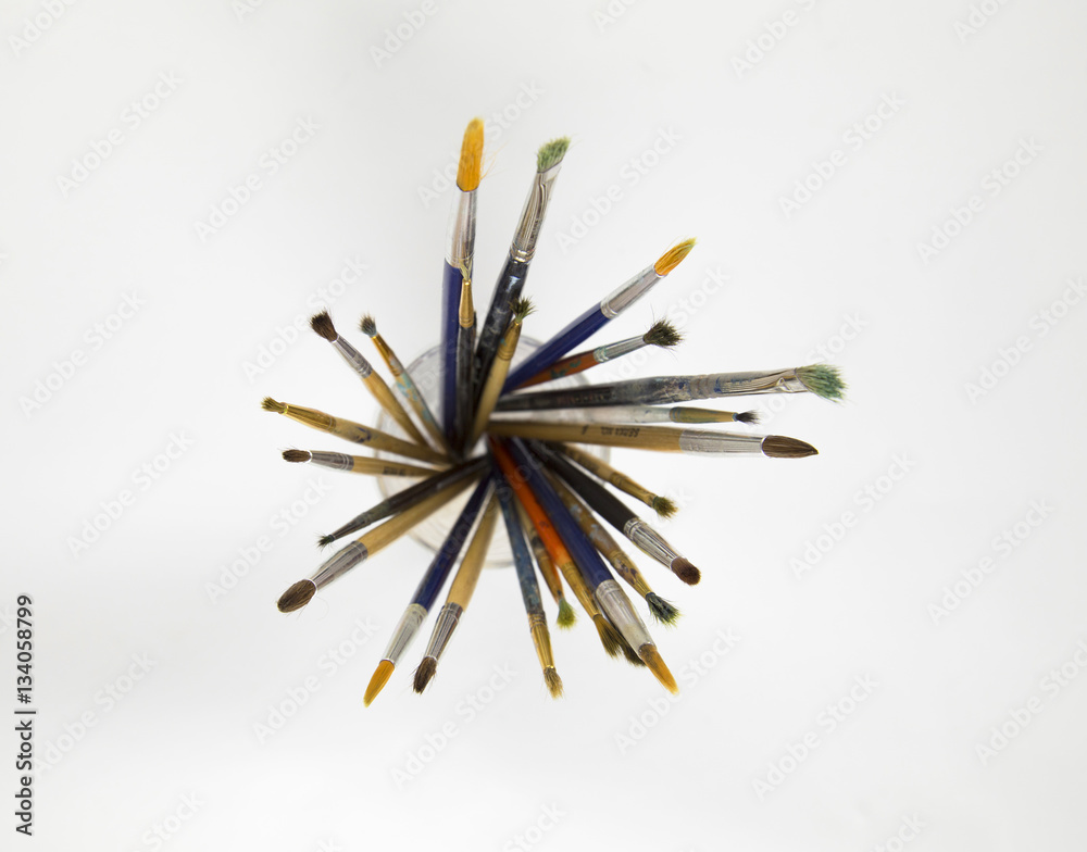 Fototapeta premium painting brushes top view on isolated white background
