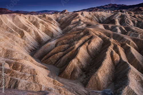 Spooky light after sunset in Death Valley at Zabriskie Point, CA