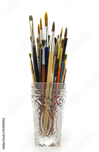 painting brushes in glass