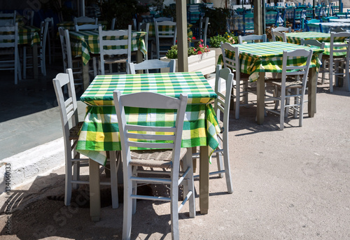 Wooden chairs and tables at traditional Greek tavern
