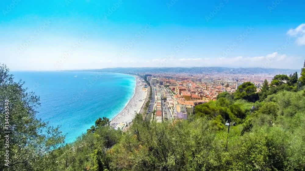 Beautiful panoramic aerial view of beach in City of Nice in sunny summer day. Cote d'Azure, France. City of Nice is a famous and luxury resort of French riviera. Time Lapse. 4K UltraHD Beautiful panoramic aerial view of beach in City of Nice in sunny summer day. Cote d'Azure, France. City of Nice is a famous and luxury resort of French riviera. Time Lapse. 4K UltraHD