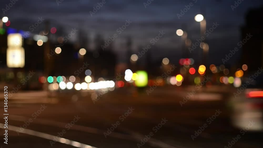 City Traffic with Lights and Cars by Night abstract 