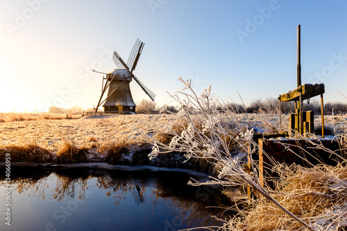 Windmill near Sande at cold winter morning photo