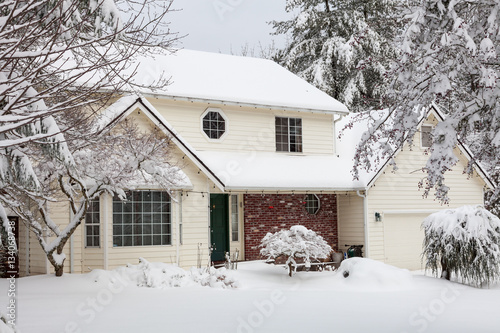 Wallpaper Mural Residential home.  Average american two story residential home covered with snow during winter storm. Torontodigital.ca