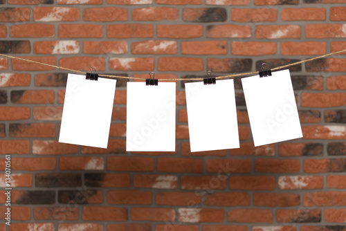 mock up white poster on brick background
