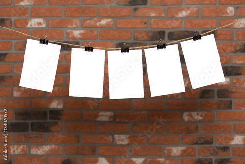 mock up white poster on brick background