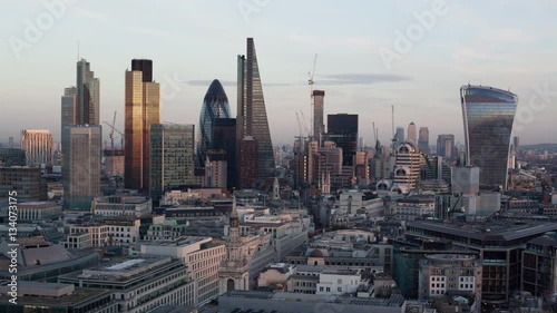 Establishing shot elevated view - day to night time-lapse of the business district of London England