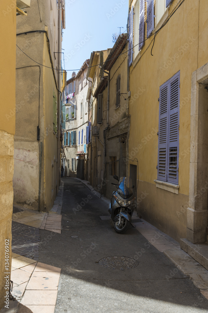 La Ciotat narrow street shadow sun historic town.