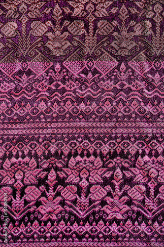 old colorful thai handcraft peruvian style rug surface old vintage torn conservation Made from natural materials Chemical free close up.