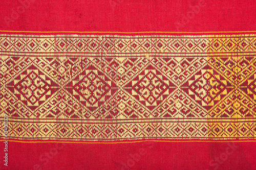 colorful thai silk handcraft peruvian style rug surface old vintage torn conservation Made from natural materials Chemical free close up silk background silk texture photo