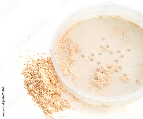 Close-up of cosmetic loose powder in jar
