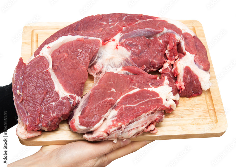 meat on a board on a white background