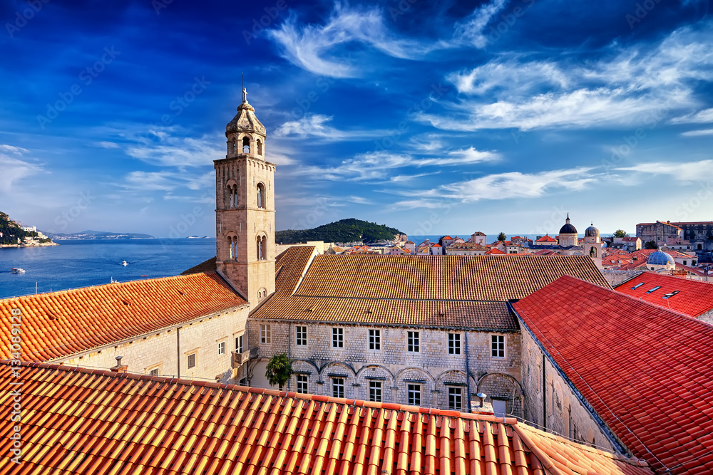 Amazing panorama Dubrovnik Old Town roofs at sunset and blue sky