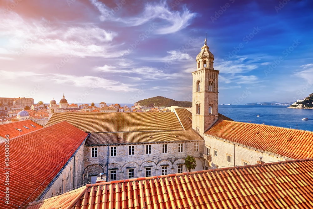Amazing panorama Dubrovnik Old Town roofs at sunset and blue sky