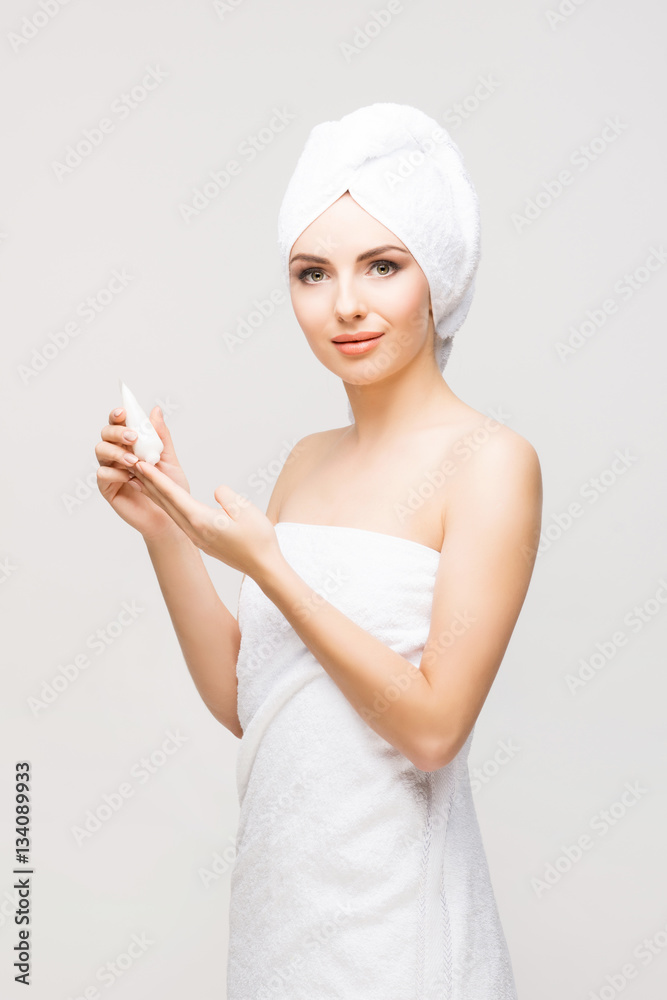 Young, beautiful woman wrapped in a towel Young, beautiful woman wrapped in a towel