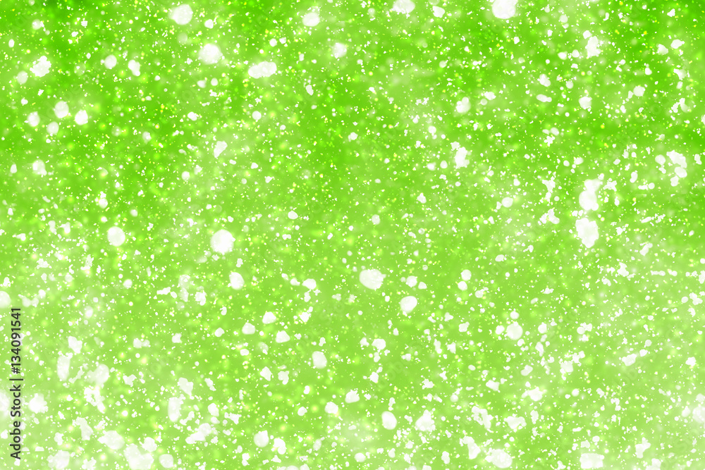 Green abstract background. White bokeh or particles Green abstract background. White bokeh or particles