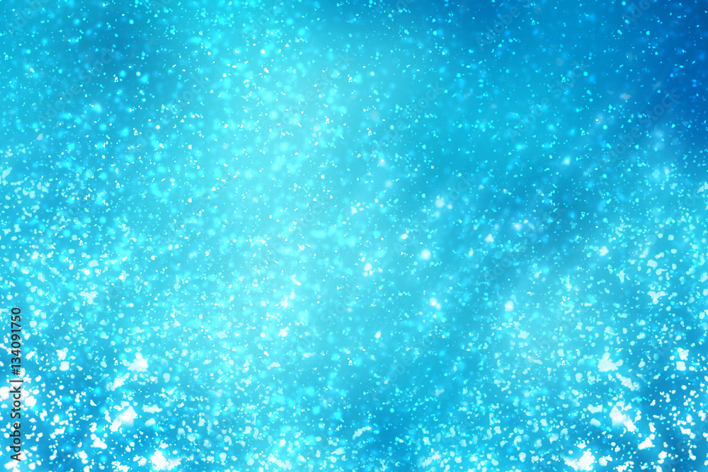 Abstract round silver bokeh or glitter lights on blue background. Circles defocused particles