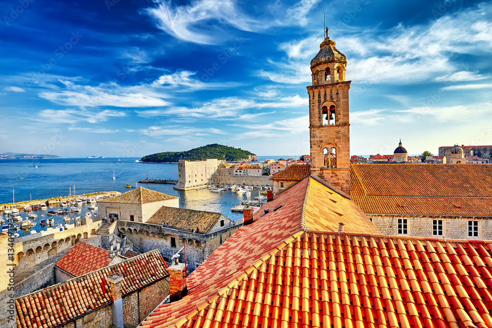 Fototapeta premium Amazing panorama Dubrovnik Old Town roofs at sunset. Europe, Cro