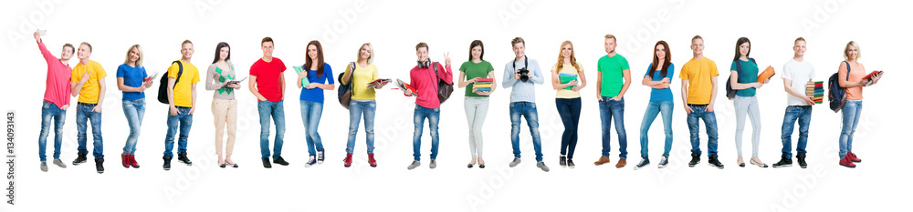 Group of smiling teenagers staying together Group of smiling teenagers staying together