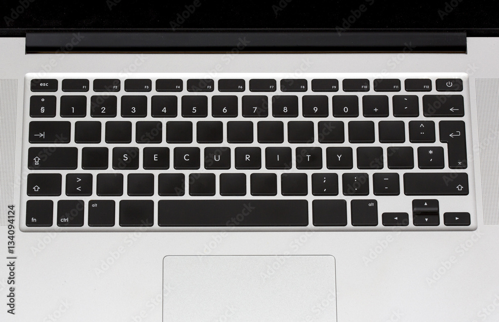 Security text written on a plain keyboard layout. Business and internet security concept image. Security text written on a plain keyboard layout. Business and internet security concept image.