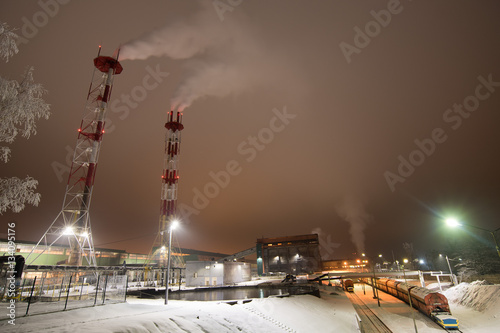 Enrichment copper factory at winter night photo