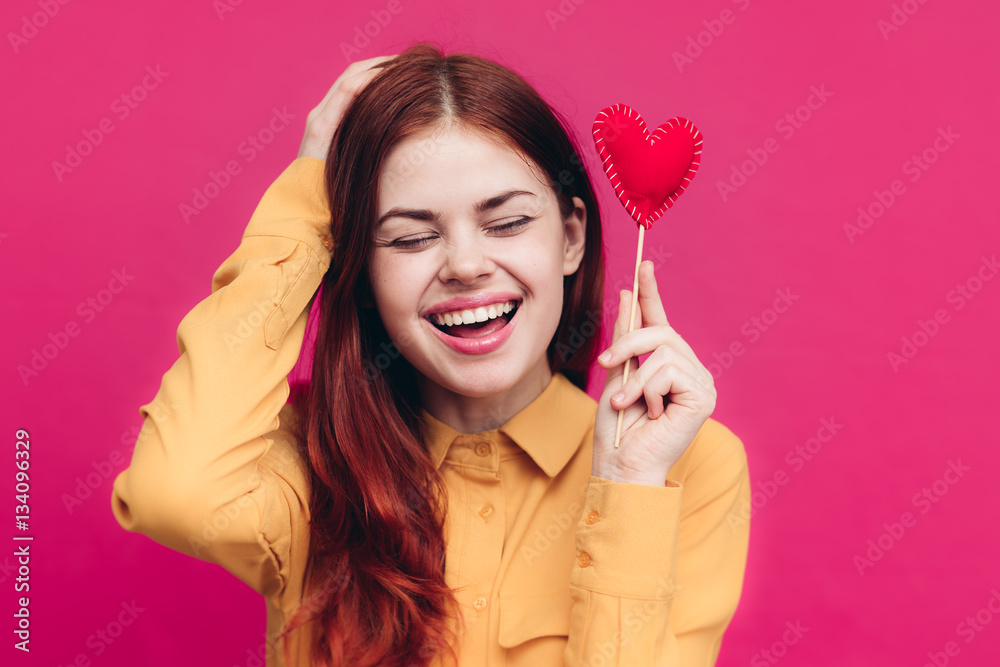 woman on a pink background, holiday, hearts, a day of lovers woman on a pink background, holiday, hearts, a day of lovers