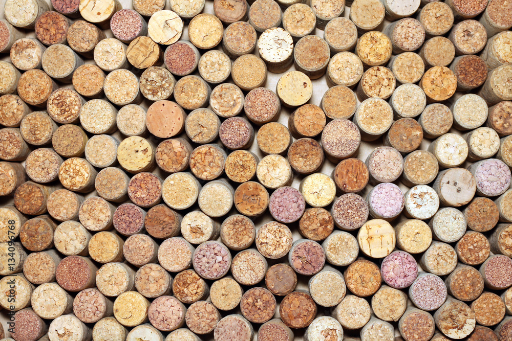 Background of used wine corks. Wall of many different wine corks. Closeup of wine corks. Background of used wine corks. Wall of many different wine corks. Closeup of wine corks.