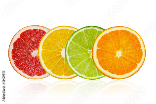 Pieces of grapefruit, lemon, lime, orange isolated on white background
