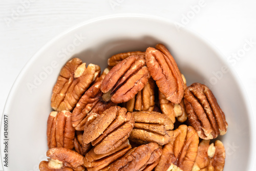 Pecan Nuts In White Bowl On Table