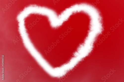 heart made by white smoke on red background with white clouds  valentine day and love