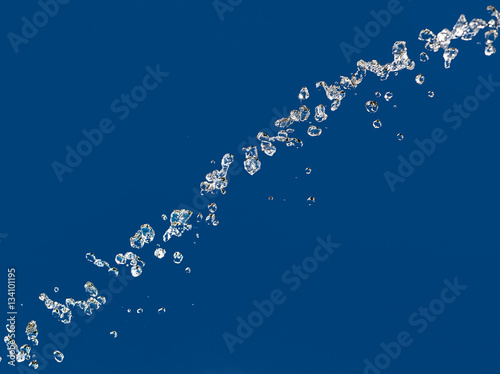 Canvas Print splashing of water drops on a blue background