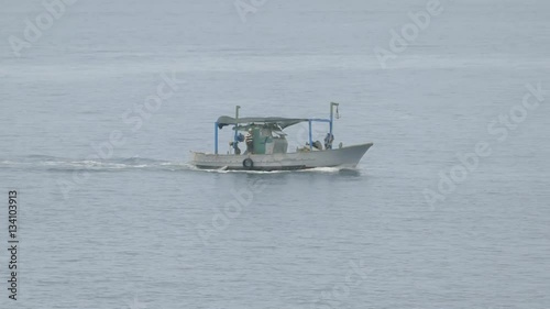 Fishing boat at sea 4
Shooting of a fishing boat sailing in the sea of Puglia between the merchant ships